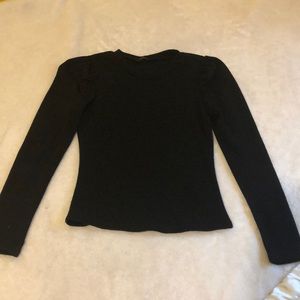 Black long sleeve, with puffy sleeves.